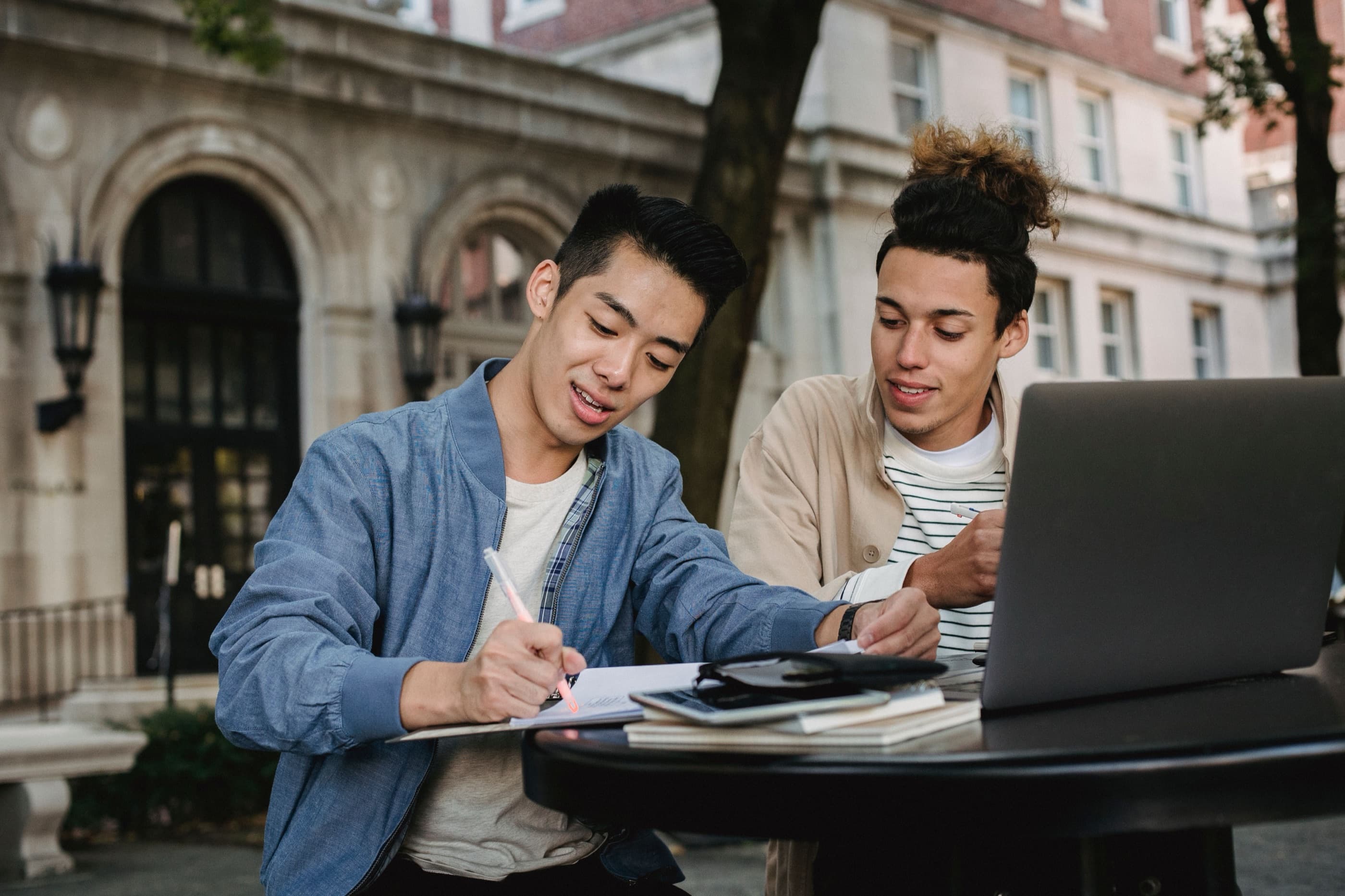 Malaysian and international students studying together on a university campus, planning study in Australia with Hays Migration